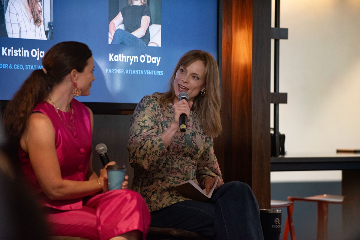 Kristin Oja laughing during the fireside chat