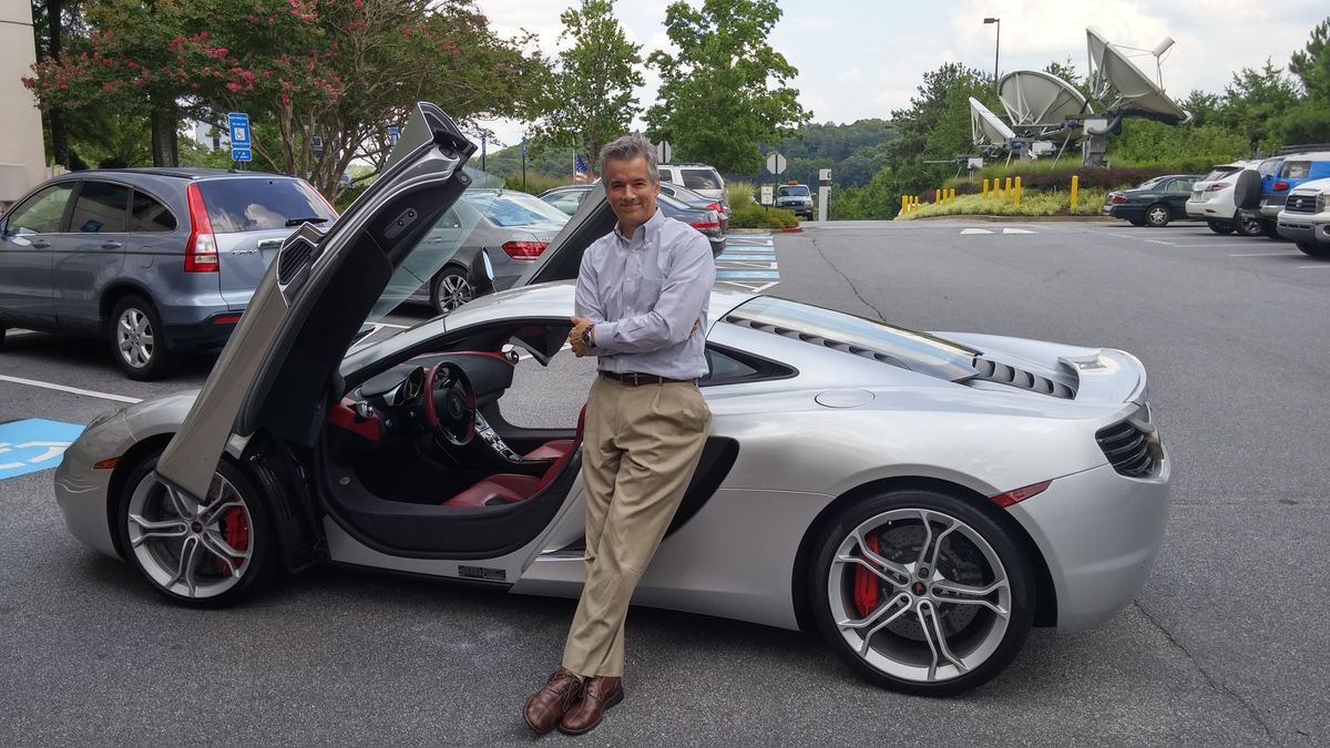 Low key driving the Maclaren to a customer visit